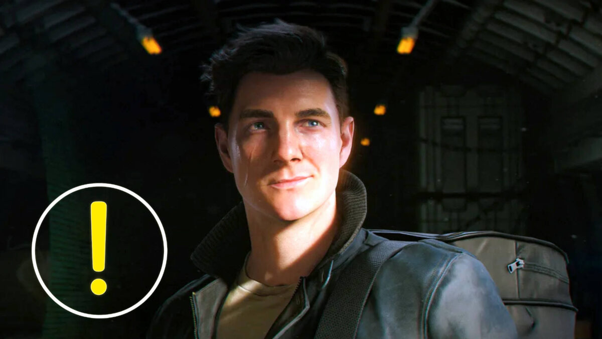 A young man with a scar on his cheek and a leather jacket pulls the corners of his mouth up into a grin.