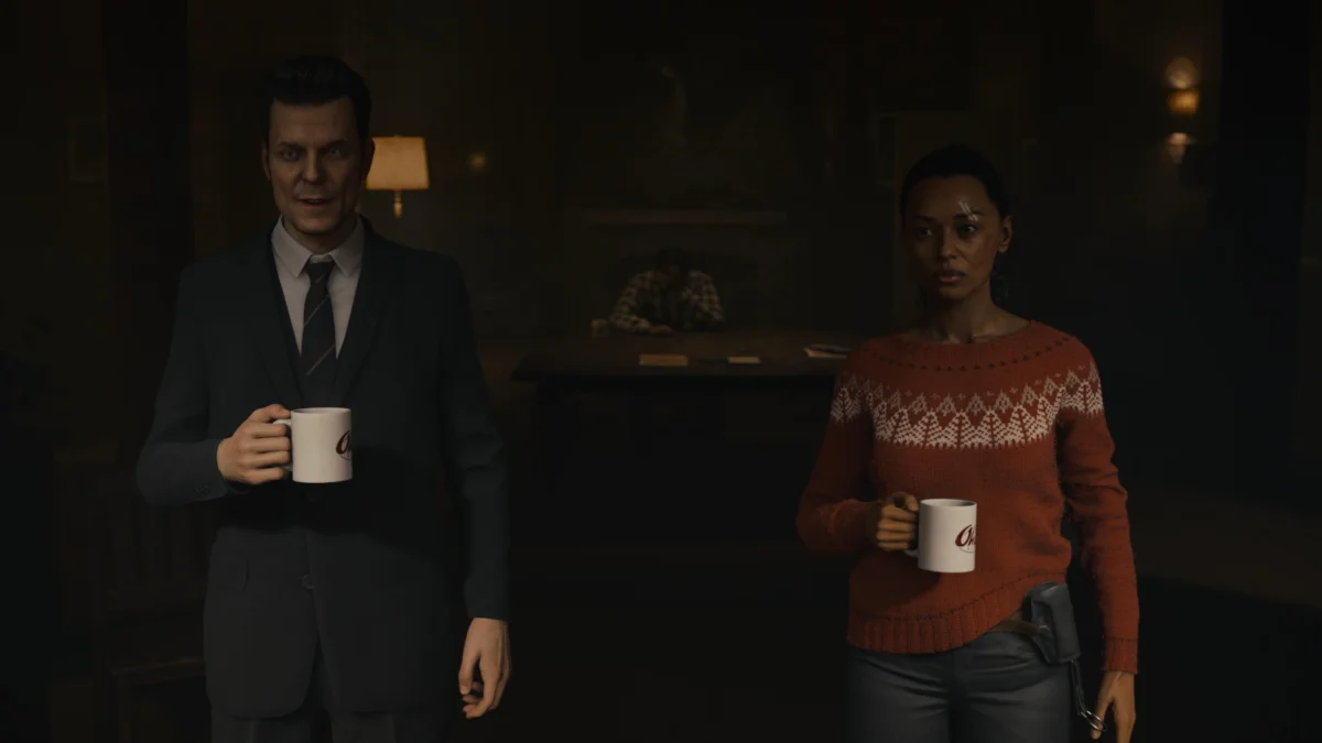 Saga und Casey stehen in Alan Wake nebeneinander. Beide halten eine weiße Kaffeetasse in der rechten Hand.