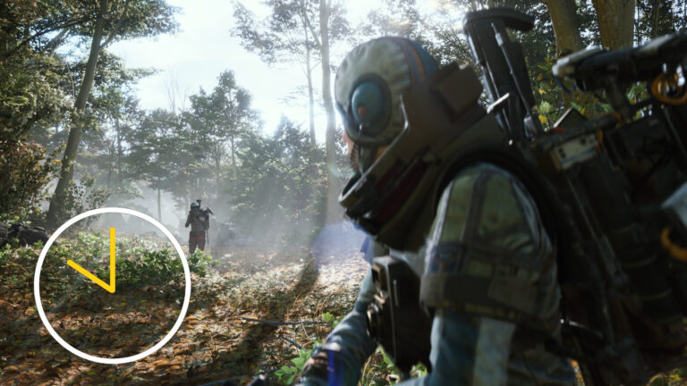Ein Mann in voller Ausrüstung schaut zu einem anderen Mann mit Waffe.
