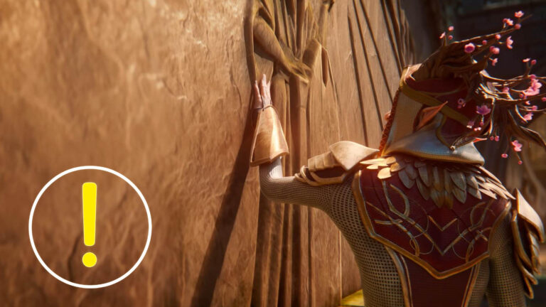 Eine Person steht vor einer Steinwand und fühlt mit der Hand über einige Bilder.