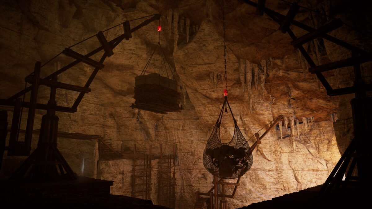 Eine Palette und ein Netz mit Steinen, die in Assassin's Creed Valhalla an einem Holzkonstrukt befestigt sind.