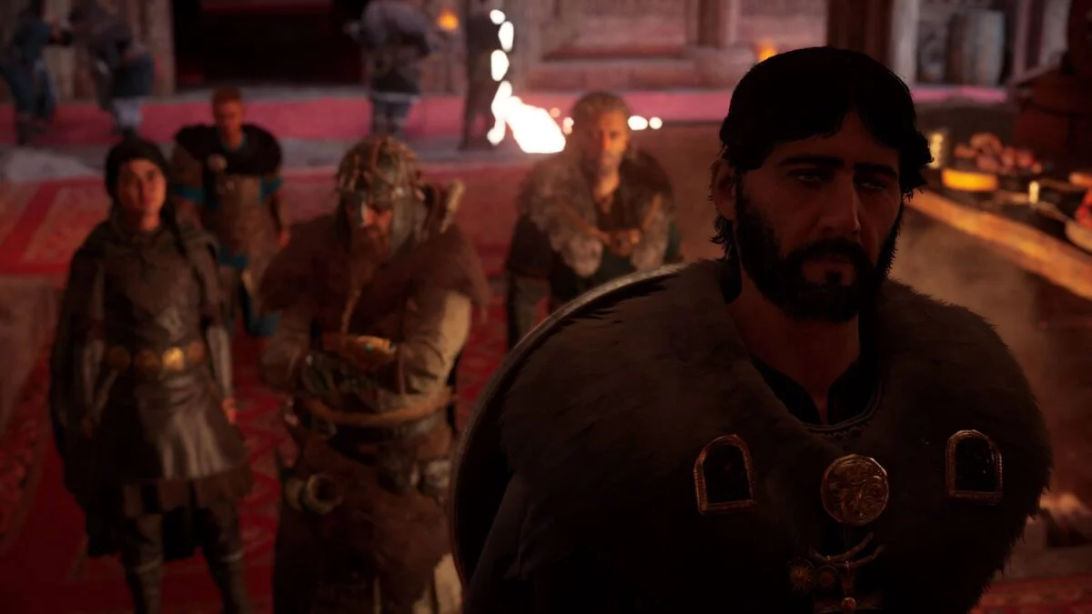 Eivor, Ljufvina und Hjör sprechen mit König Ricsige in Assassin's Creed Valhalla. 