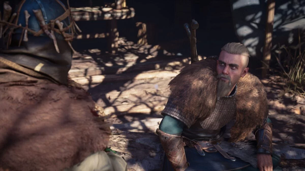 Wikinger Eivor spricht in Assassin's Creed Valhalla mit Faravid.