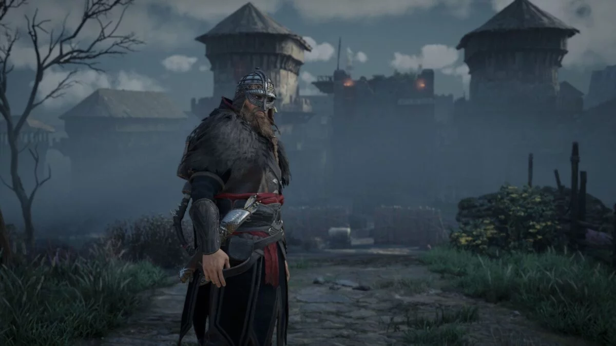 Wikinger Eivor steht in Assassin's Creed Valhalla vor den Toren von Portcaester.