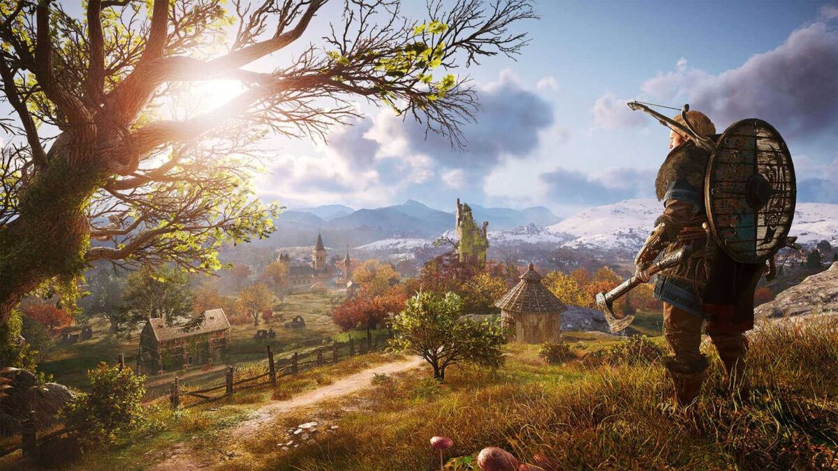 Wikinger Eivor blickt auf ein englisches Dorf in Assassin's Creed Valhalla.