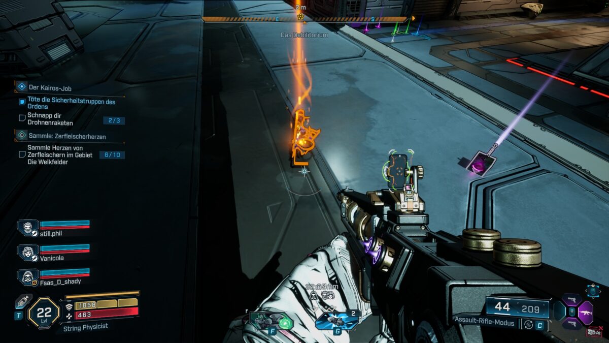 A weapon glowing in a striking golden hue lying on the ground.
