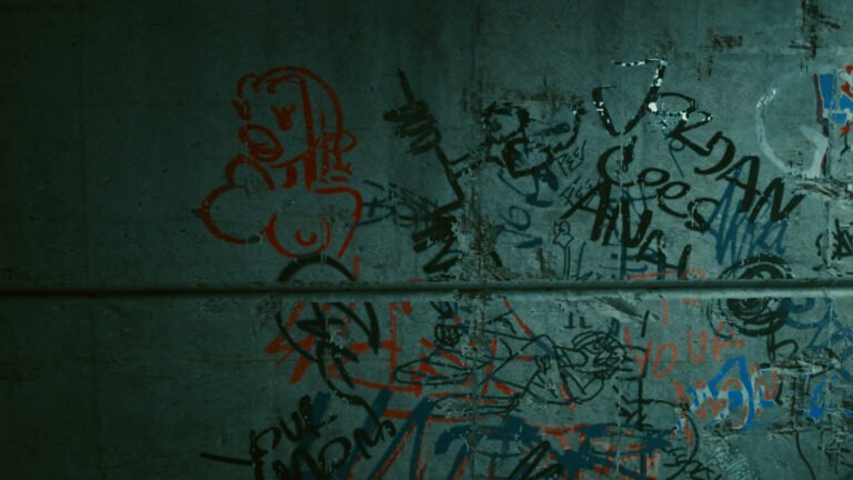Woman as sexualized wall graffiti in Cyberpunk 2077