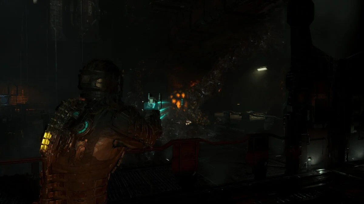 Isaac zielt auf eine leuchtende Ranke in Dead Space. 