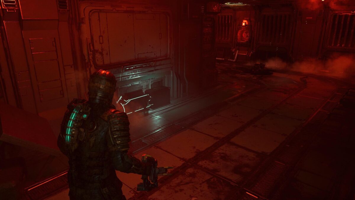 Isaac steht vor einer Energiezelle in einem Korridor. 