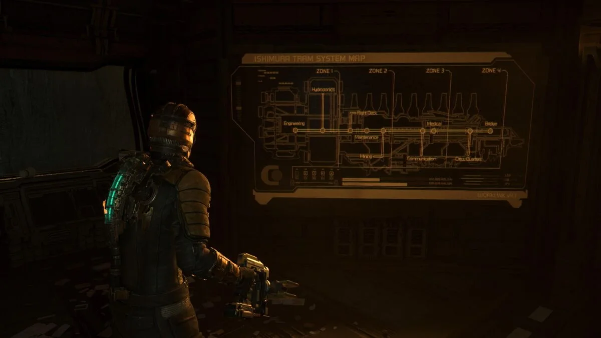 Isaac studiert den Plan der Monorail in Dead Space. 