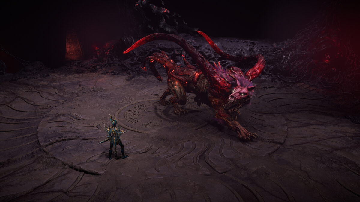 Ein großes rotes Monster steht vor einem kleinen Krieger, ohne anzugreifen.