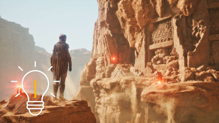 Eine Person steht auf einem Felsen in einem Canyon und blickt über die Schlucht auf einen verschütteten Tempelzugang.