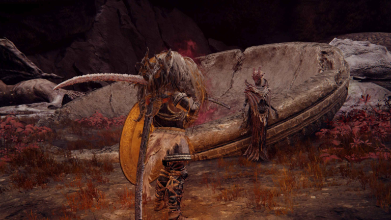 Ein Screenshot aus Elden Ring zeigt ein Gespräch zwischen dem Protagonisten und dem NPC, der ihm den Segen des uralten Drachens überreicht.