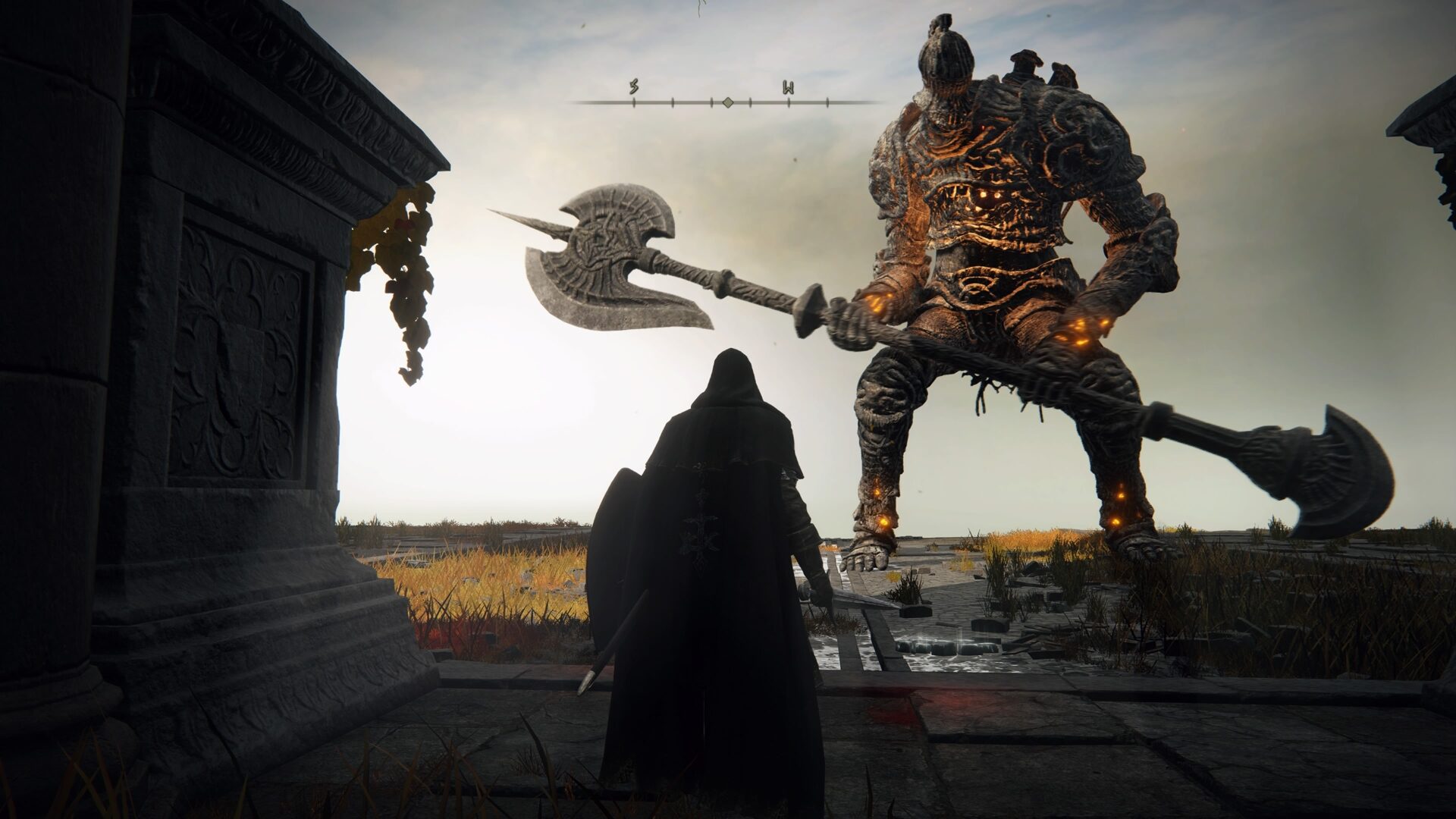 In Elden Ring steht die Spielfigur einem Giganten gegenüber.