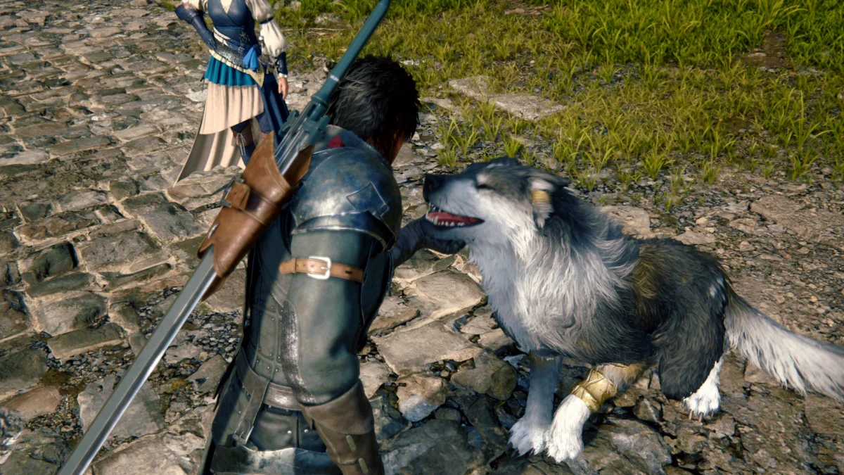 Clive streichelt Hund Torgal in Final Fantasy 16.