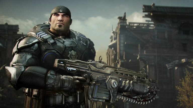 A man in heavy armor holding a large weapon.