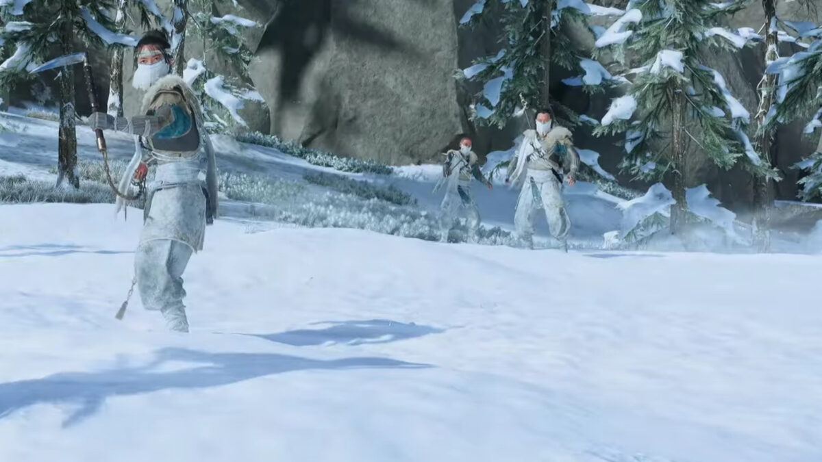 Three People are standing in the Snow, holding a Kunai in their hands.