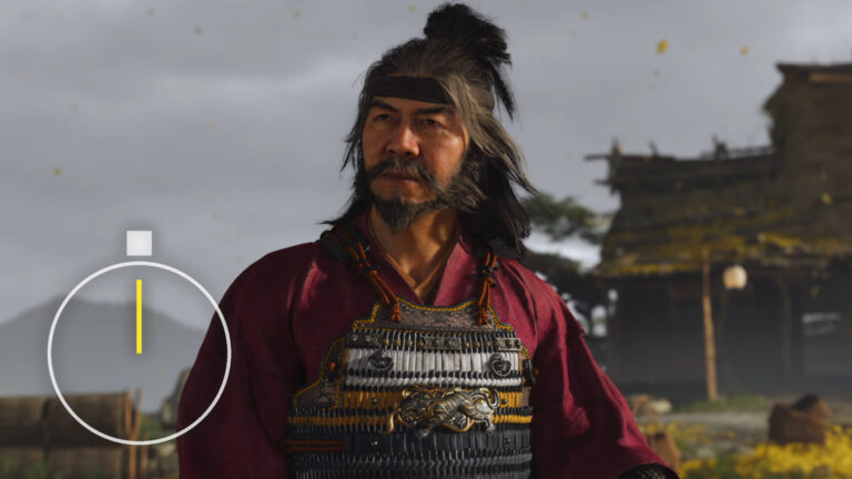 A man with long hair, a beard, and a headband looks determined.