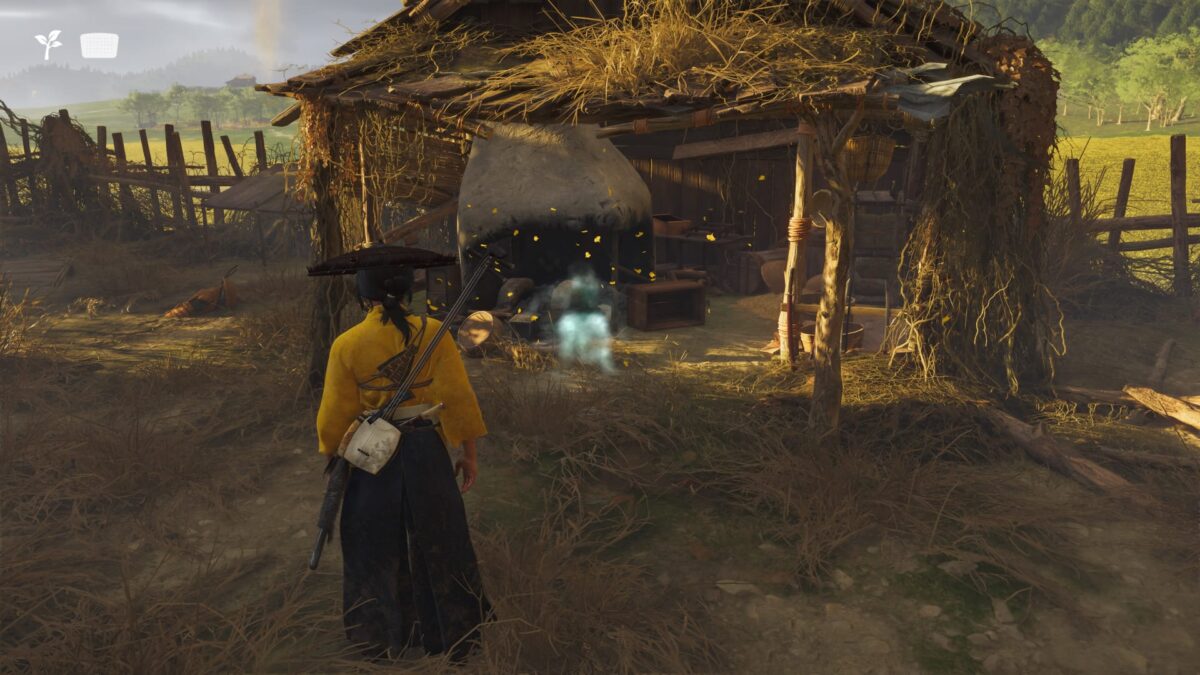 Atsu is standing in front of an old forge.