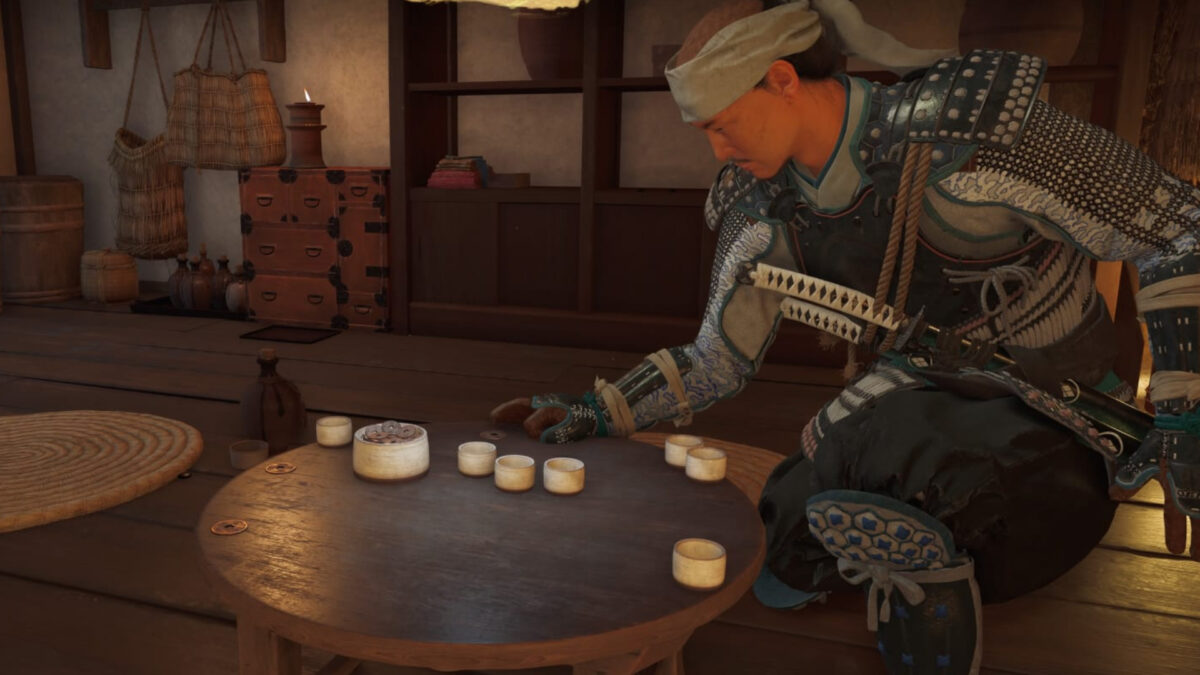 A man is gambling on a small table.