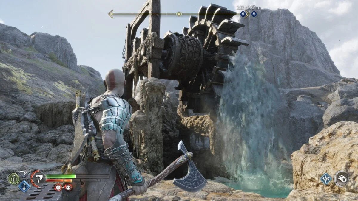 Kratos steht in God of War Ragnarök vor einem Geysir und einem Wasserrad.