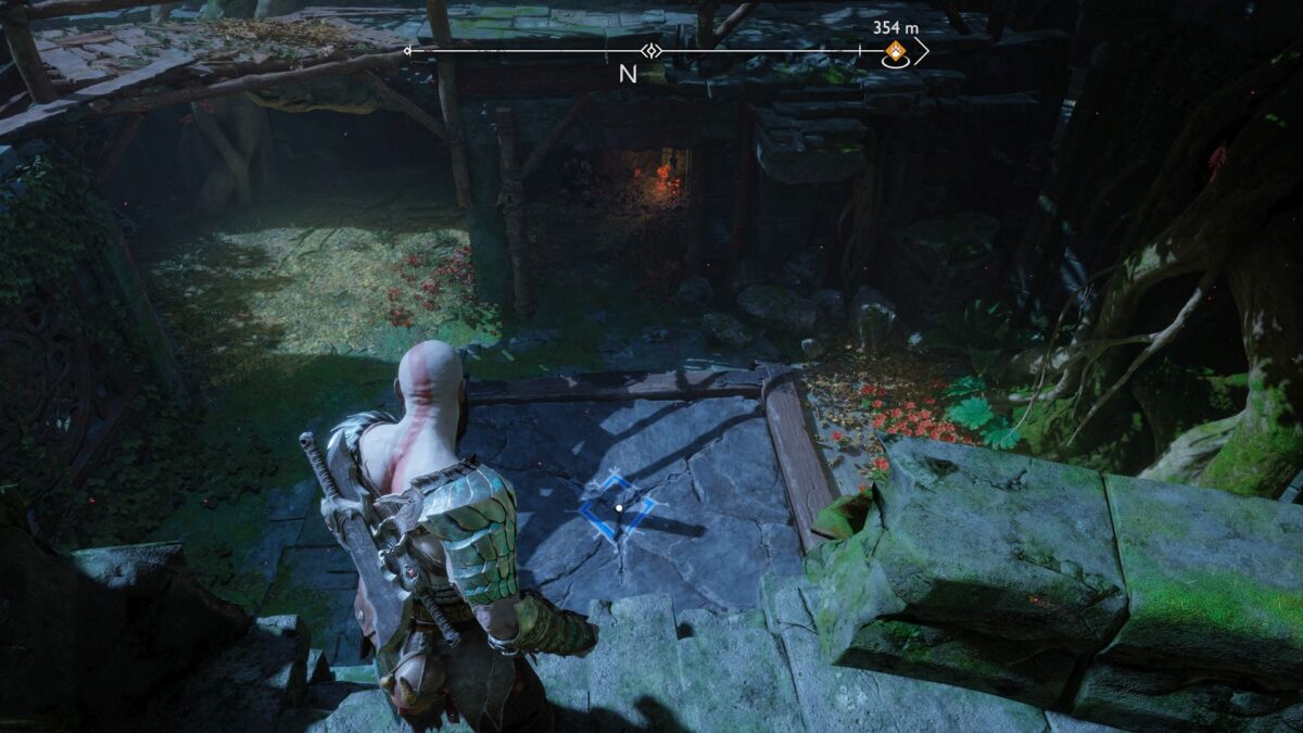Kratos blickt in God of War Ragnarök auf eine rissige Bodenplatte hinab.