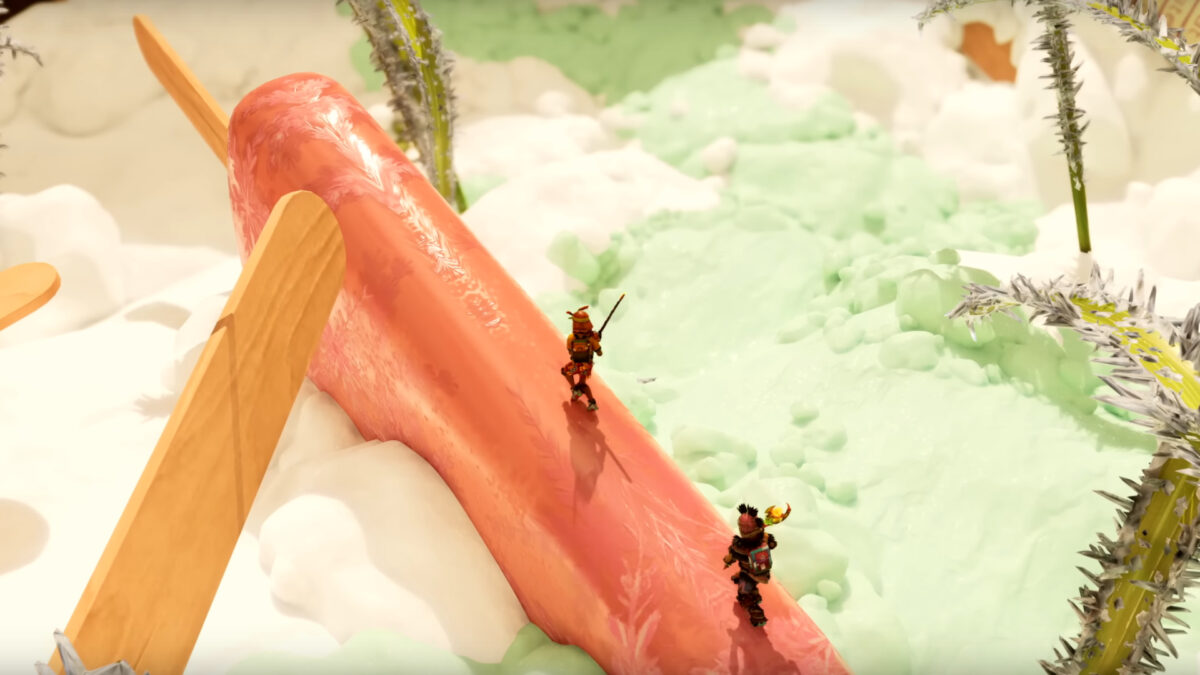 Eine Wurst liegt auf einem Berg aus Schnee, während zwei geschrumpfte Personen darüber laufen.