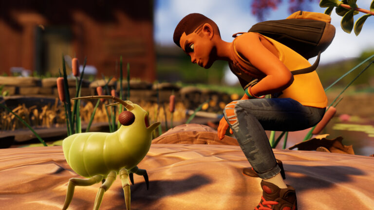 A teenager looking at a small green insect.