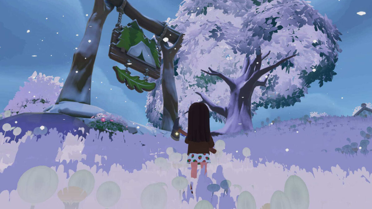 Ein Mädchen steht vor einem Schild mit Zelt und Blatt drauf. Dahinter ein großer Baum.