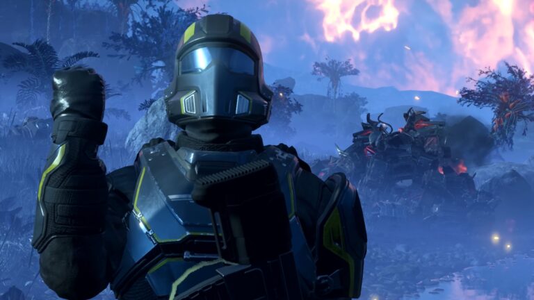 A soldier in futuristic armor stands in Helldivers 2 in front of a destroyed alien creature on a battlefield.
