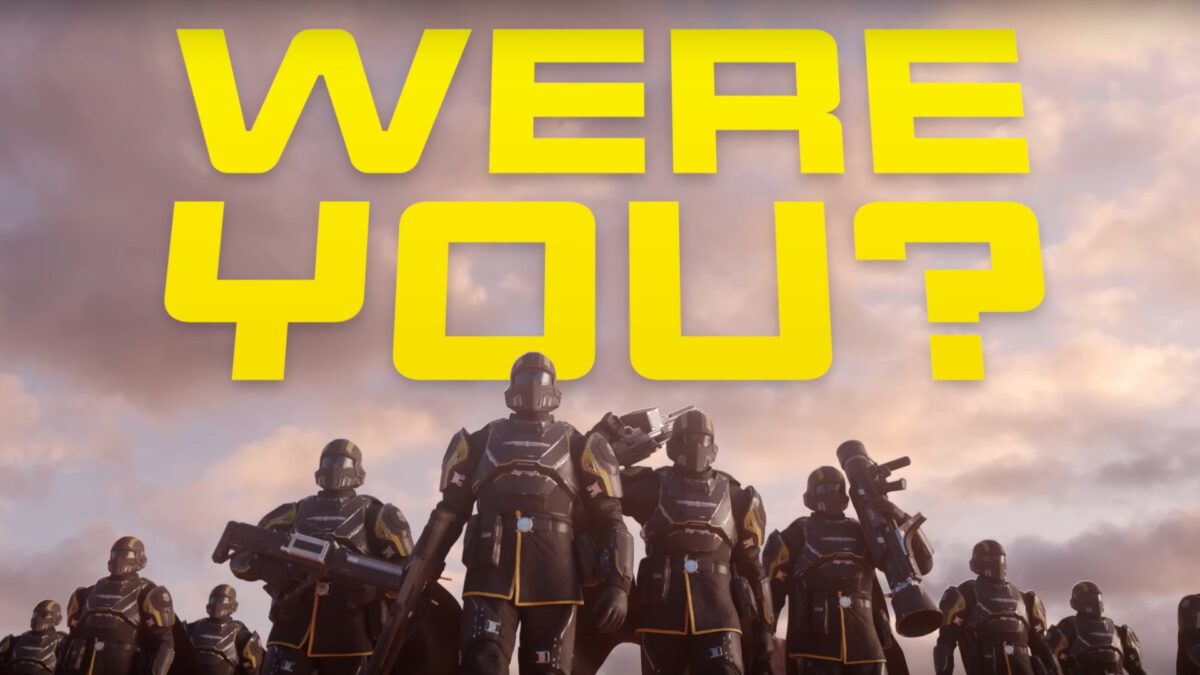Several Helldivers stand side by side, holding weapons in their hands.