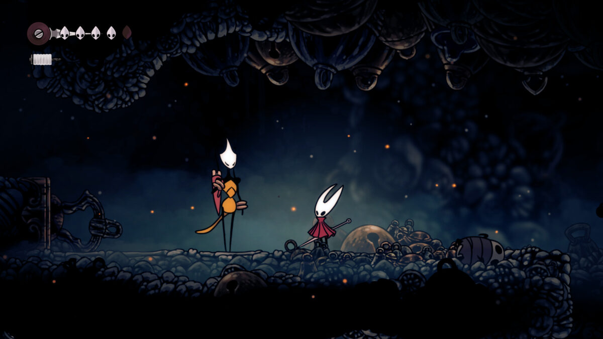 Hornet stands next to Shakra.