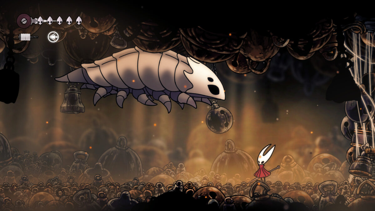 Hornet stands beneath a white beast in the bell chamber.