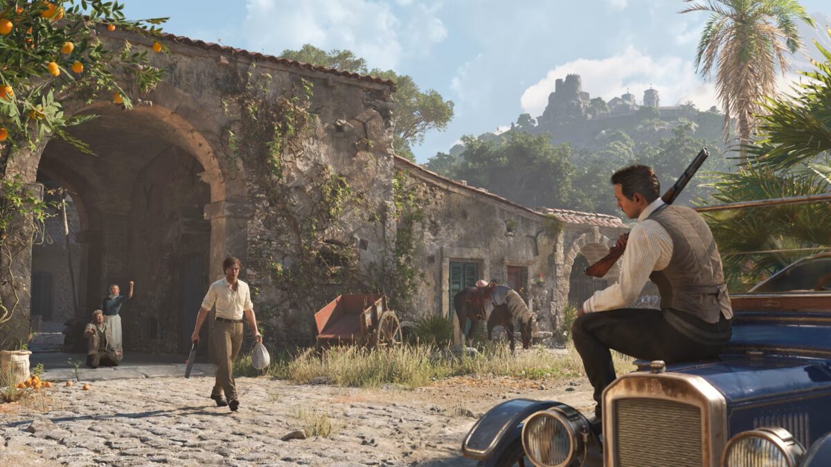 Two mafiosi with guns in their hands stand facing each other in an old Sicilian courtyard.