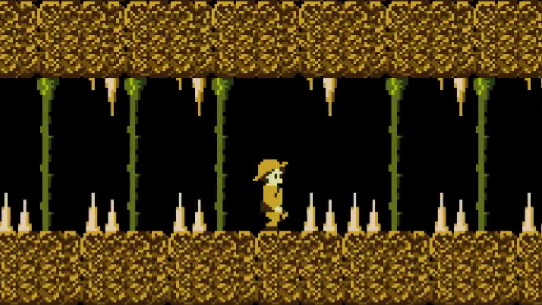 Ein Screenshot eines NES-Klassikers zeigt ein 8-Bit-Spiel, bei dem ein Abenteurer durch eine Höhle geht.