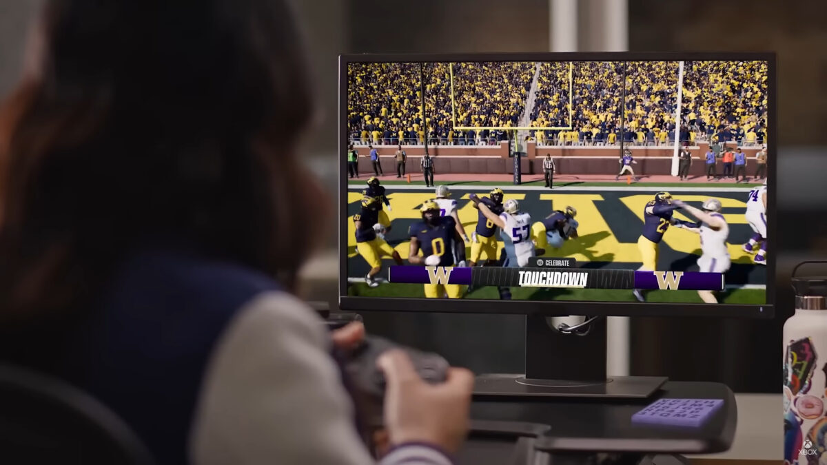 A woman is playing a game on the tv