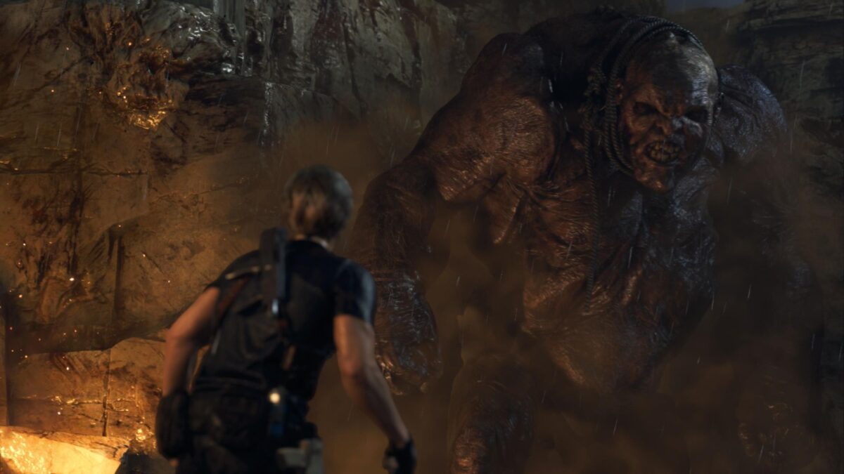 Leon steht in Resident Evil 4 einem Riesen gegenüber.