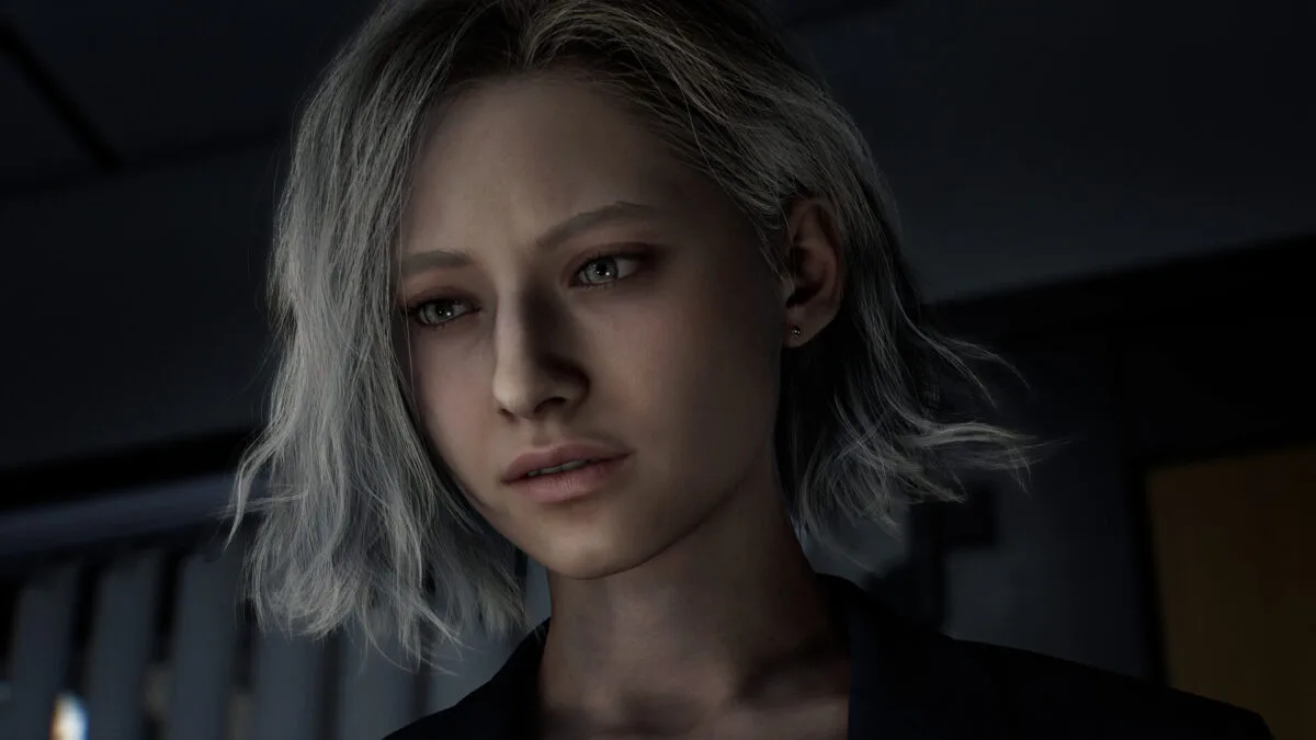 Eine junge Frau in Resident Evil Requiem mit schulterlangen blonden Haaren und traurigem Blick.