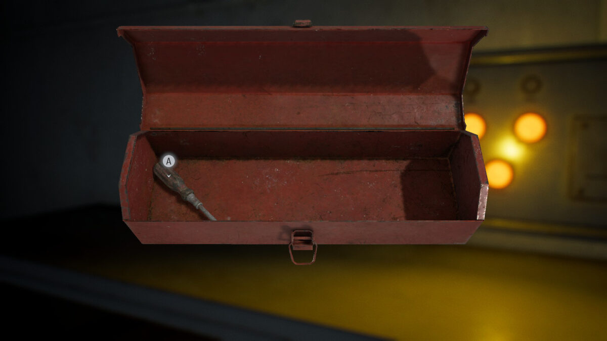 Eine rote Box mit einem Schraubenzieher drin.