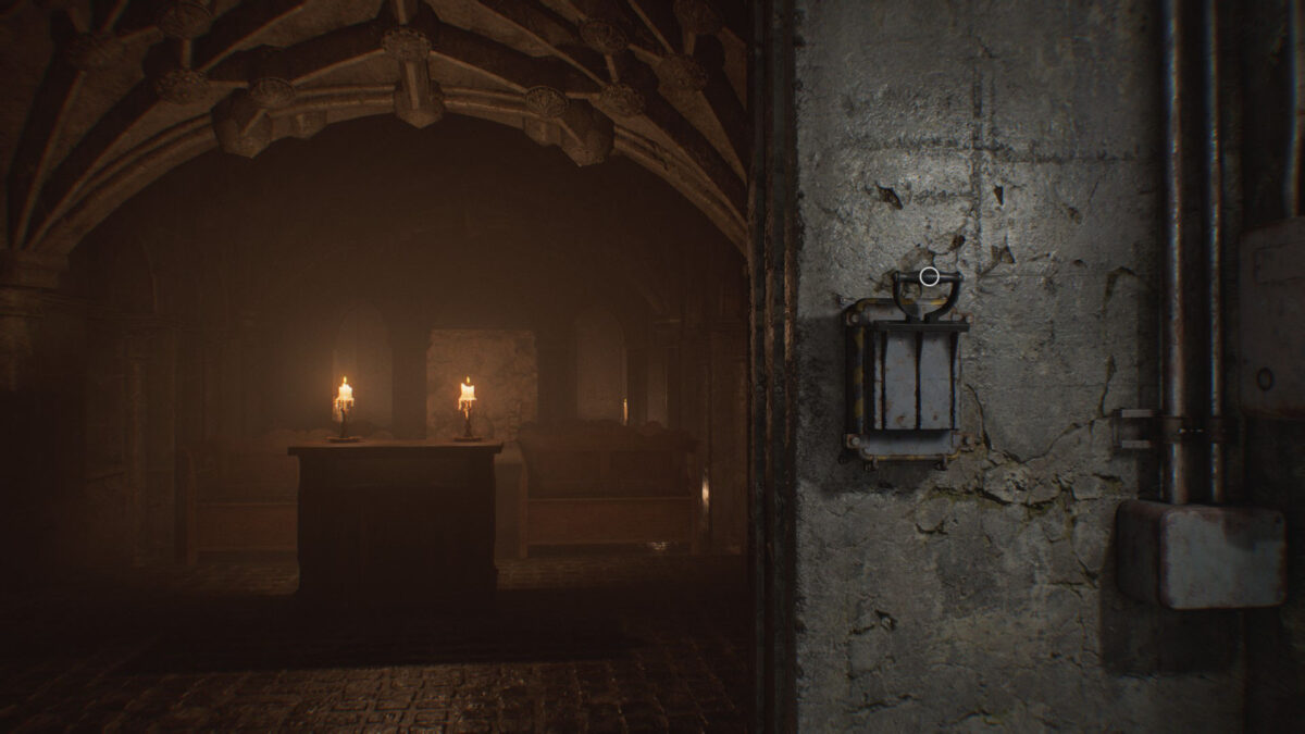 Ein Hebel an einer Wand in einer Kapelle.