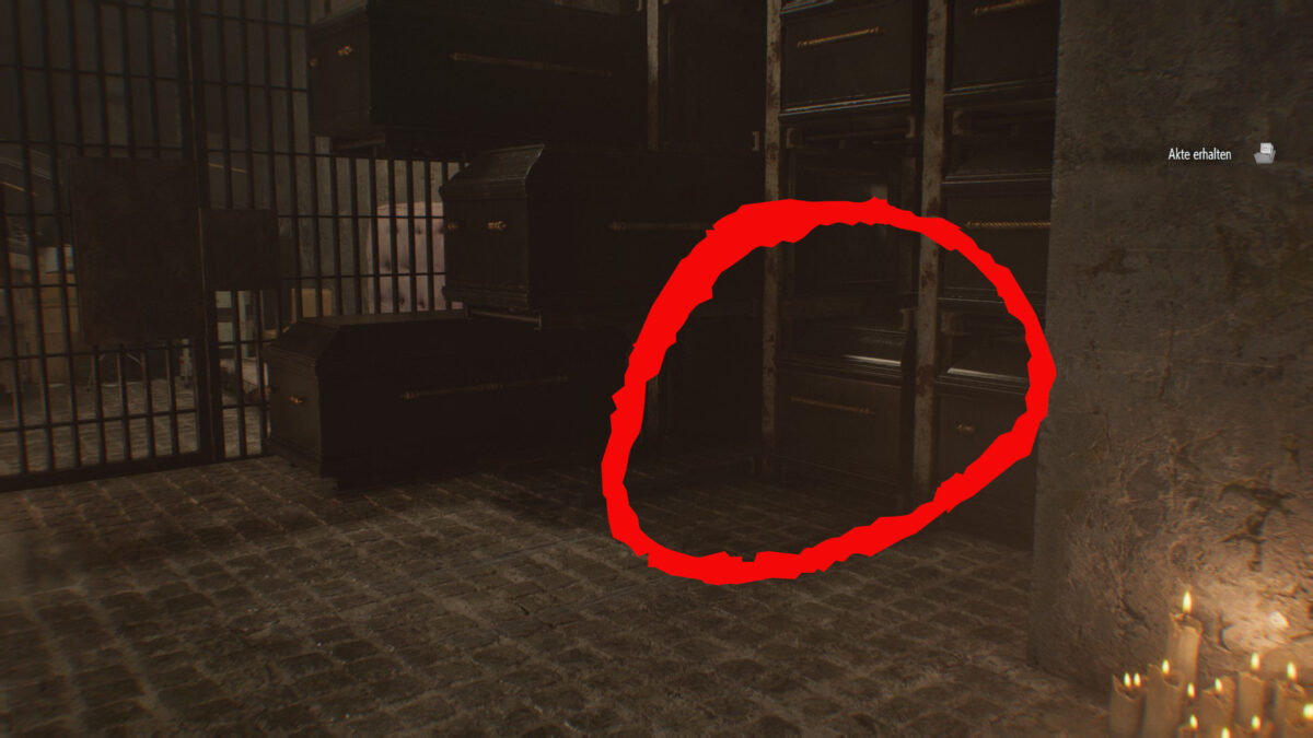 Mehrere Särge, einer davon in Rot eingekreist.