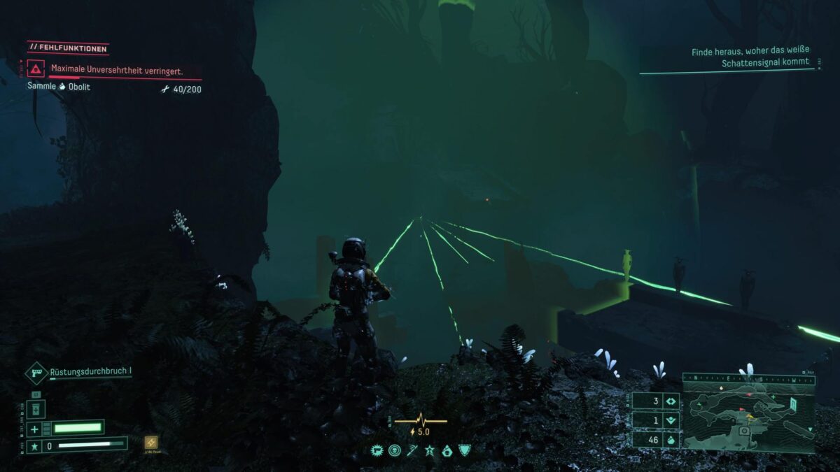 Selene faces green rays in the PS5 game Returnal.