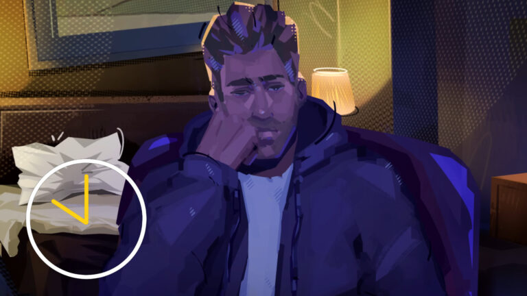 A bored Man sitting and leaning his head on his hand.