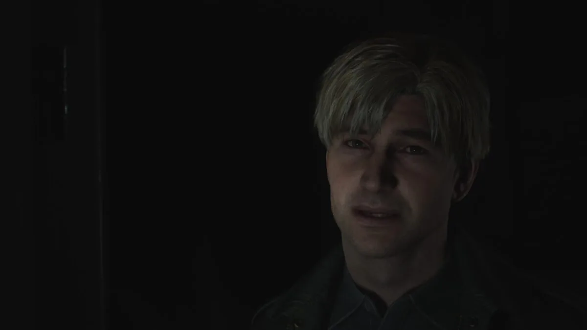 James spricht in Silent Hill 2 mit besorgtem Blick.