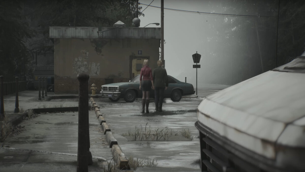 Maria und James verlassen Silent Hill über den Parkplatz.