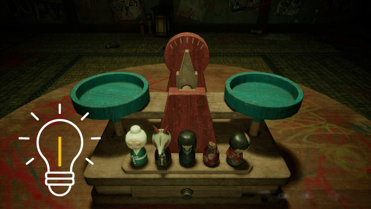 A scale with several wooden figurines.