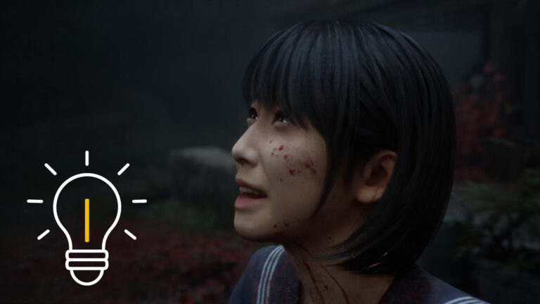 A Japanese girl looks up in tears, her face flecked with blood.
