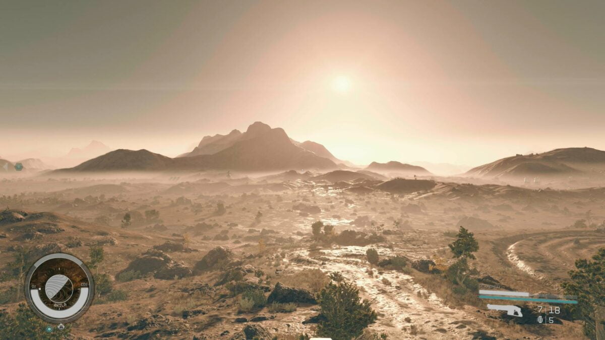 Eine Panoramaaufnahme eines Planeten von Starfield zeigt Berge am Horizont einer Wüstenlandschaft.
