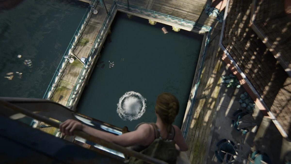 Abby steht in The Last of Us 2 am Rand einer Gondel des Riesenrads.