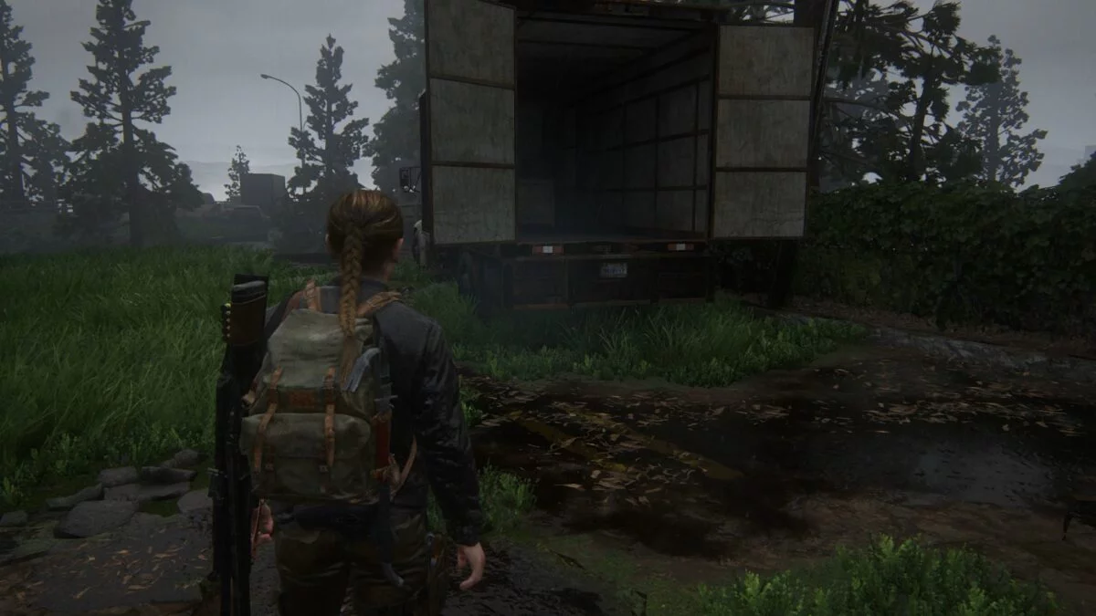 Abby steht in The Last of Us 2 vor einem Lkw auf der Insel.